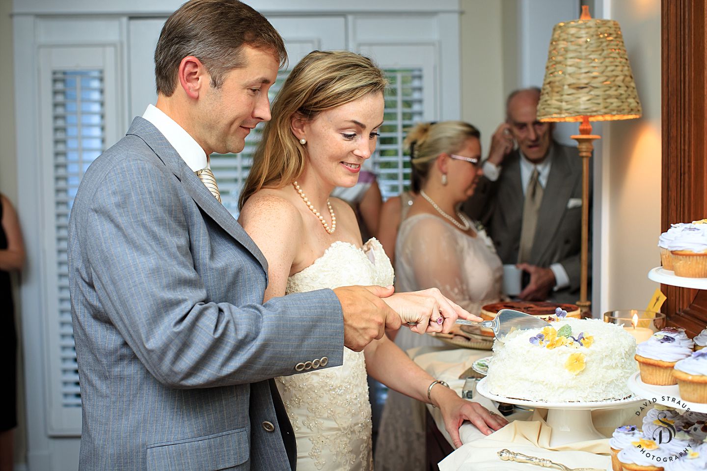 cake cutting - Sullivans Island wedding Photographers - Melissa and Brian - David Strauss Photography