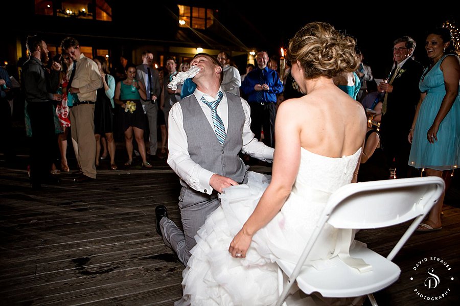 garter in mouth - Lake House on Bulow - Charleston Wedding Photography - Jody and Joe