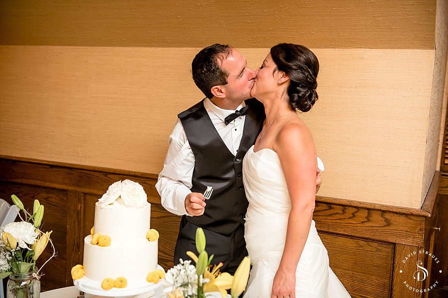 Cake kiss - Wild Dunes Wedding Photography - Jennifer and Daniel